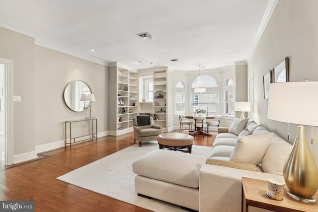 1830 S Rittenhouse Square 12C And 12D, Philadelphia, PA 19103 - living room featuring crown molding, wood finished floors, built in shelves, and baseboards