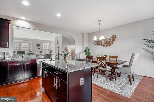 2620 Egret Way, Frederick, MD 21701 - kitchen featuring dishwasher, a sink, a center island, a chandelier, and wood finished floors