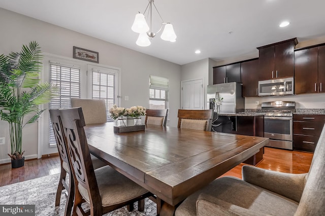 2620 Egret Way, Frederick, MD 21701 - dining room featuring a chandelier, light wood-type flooring, recessed lighting, and baseboards