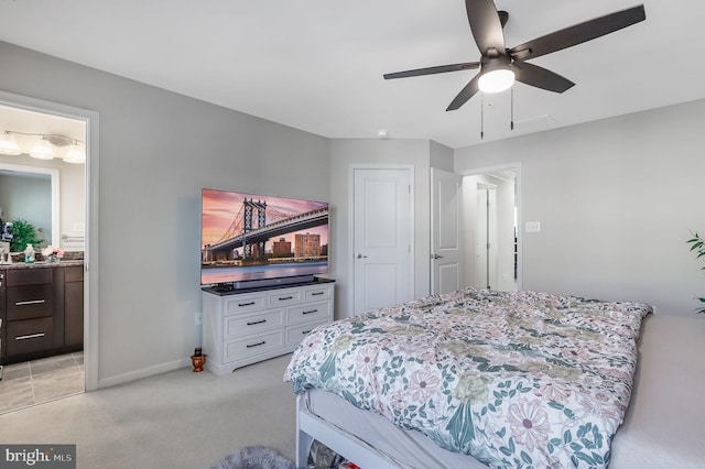 2620 Egret Way, Frederick, MD 21701 - bedroom with baseboards, light carpet, ensuite bathroom, and ceiling fan