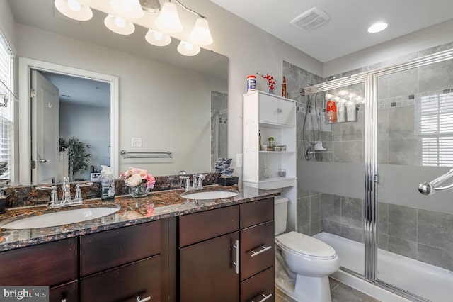 2620 Egret Way, Frederick, MD 21701 - bathroom featuring double vanity, a stall shower, toilet, and tile patterned floors