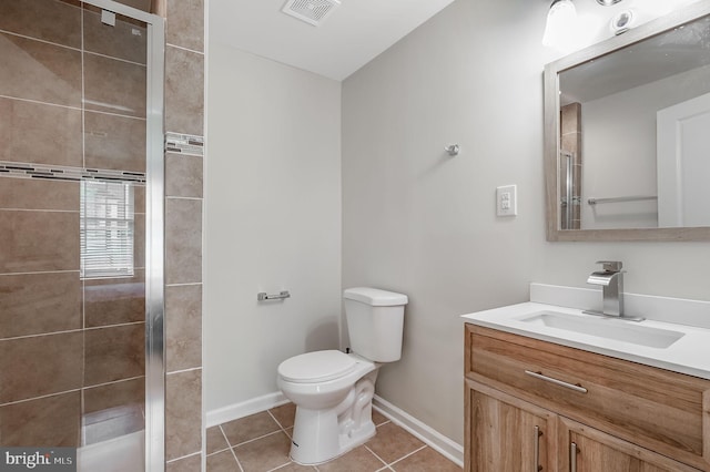 2620 Egret Way, Frederick, MD 21701 - bathroom featuring toilet, vanity, tile patterned flooring, and tiled shower