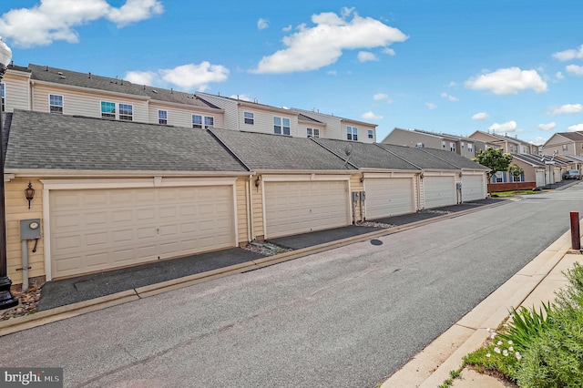 2620 Egret Way, Frederick, MD 21701 - view of asphalt street featuring a residential view, community garages, and curbs