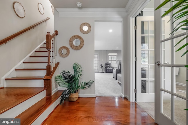 2620 Egret Way, Frederick, MD 21701 - foyer featuring crown molding, stairs, wood finished floors, and baseboards