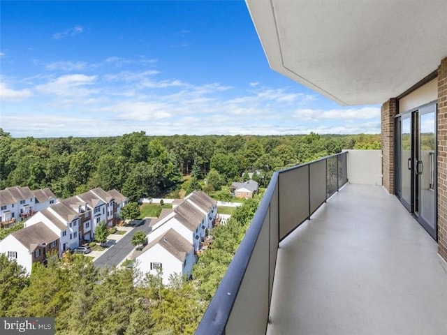2956 Hathaway Rd Unit 1205, Richmond, VA 23225 - balcony featuring a view of trees and a residential view
