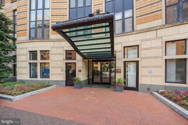 400 Massachusetts Ave NW Unit 223, Washington, DC 20001 - entrance to property featuring french doors and stone siding
