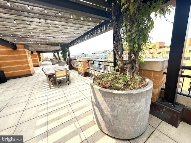 400 Massachusetts Ave NW Unit 223, Washington, DC 20001 - view of patio featuring outdoor dining space and a balcony
