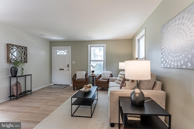 5634 8th Rd N, Arlington, VA 22205 - living area featuring light wood-style flooring and baseboards