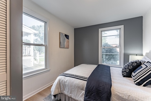 5634 8th Rd N, Arlington, VA 22205 - bedroom with multiple windows and wood finished floors