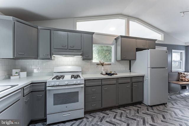 5634 8th Rd N, Arlington, VA 22205 - kitchen featuring white appliances, gray cabinets, vaulted ceiling, and light countertops