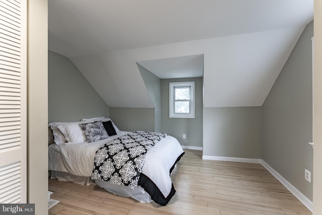 5634 8th Rd N, Arlington, VA 22205 - bedroom with vaulted ceiling and light wood finished floors