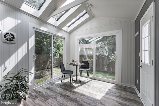 5634 8th Rd N, Arlington, VA 22205 - sunroom / solarium with a skylight, wood finished floors, vaulted ceiling, and a deck