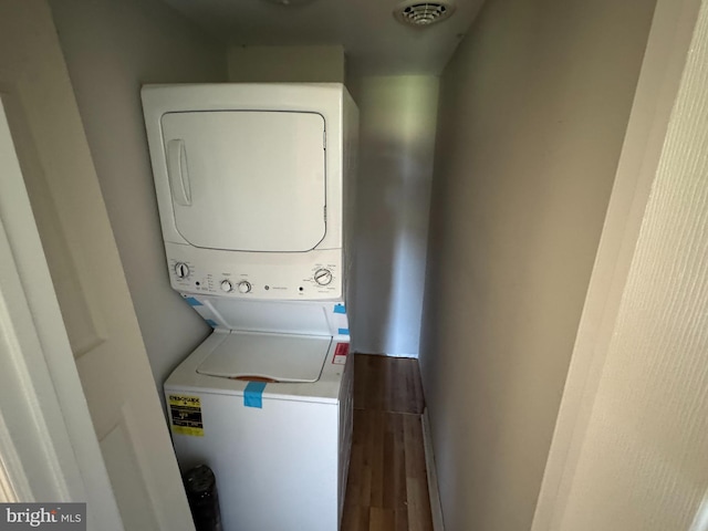 6016 Palmer Mill Rd, Hurlock, MD 21643 - washroom with stacked washer / drying machine and wood finished floors