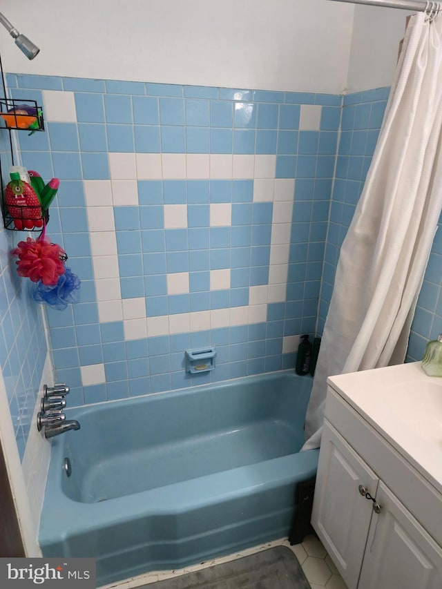 9618 Hoff St, Philadelphia, PA 19115 - full bathroom featuring shower / bathtub combination with curtain, vanity, tile walls, and tile patterned floors