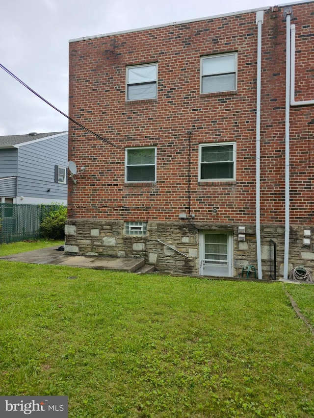 9618 Hoff St, Philadelphia, PA 19115 - rear view of house with brick siding