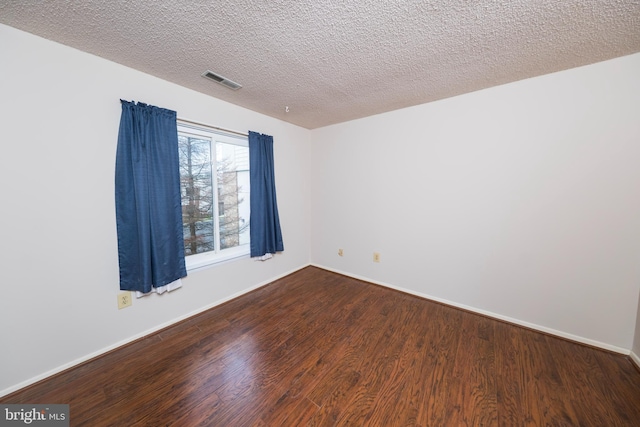 702 Downing Ct, Westampton, NJ 08060 - empty room with wood finished floors, a textured ceiling, and baseboards