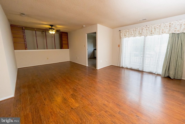 702 Downing Ct, Westampton, NJ 08060 - spare room with ceiling fan, wood finished floors, a textured ceiling, and baseboards