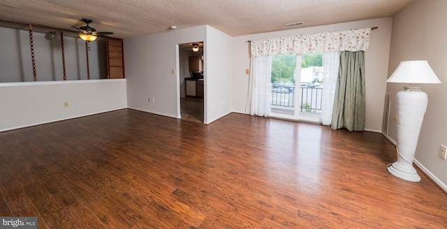 702 Downing Ct, Westampton, NJ 08060 - unfurnished living room featuring ceiling fan, wood finished floors, a textured ceiling, and baseboards
