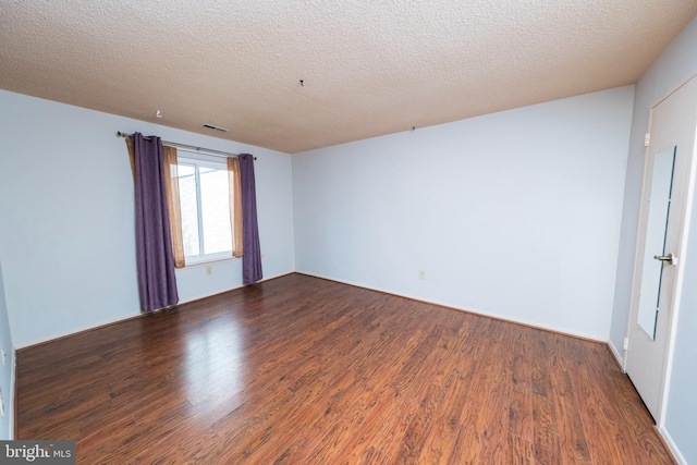702 Downing Ct, Westampton, NJ 08060 - unfurnished room with wood finished floors and a textured ceiling