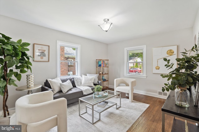 5609 35th Ave, Hyattsville, MD 20782 - living room with baseboards and dark wood-style flooring