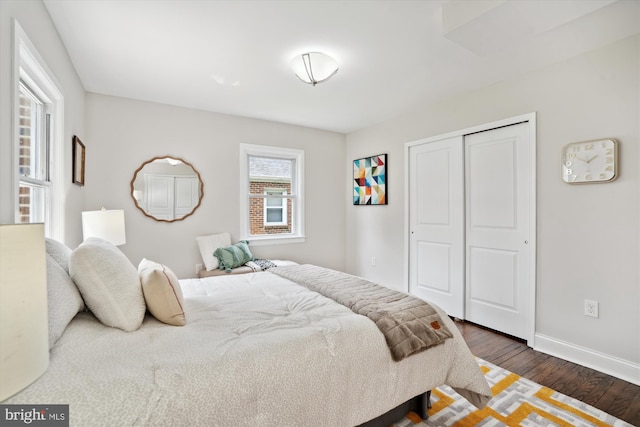 5609 35th Ave, Hyattsville, MD 20782 - bedroom with dark wood-type flooring, baseboards, and a closet