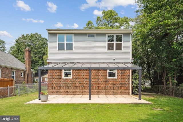 5609 35th Ave, Hyattsville, MD 20782 - rear view of house with brick siding and a patio area
