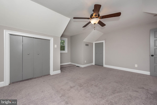 9532 Lyons Mill Rd, Owings Mills, MD 21117 - unfurnished bedroom with carpet, baseboards, lofted ceiling, ceiling fan, and a closet