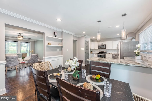 9532 Lyons Mill Rd, Owings Mills, MD 21117 - dining room featuring healthy amount of natural light, ornamental molding, baseboards, dark wood-style floors, and recessed lighting