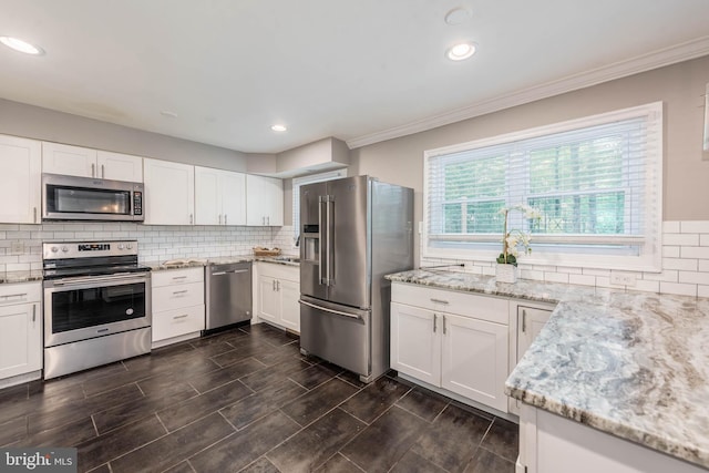 9532 Lyons Mill Rd, Owings Mills, MD 21117 - kitchen with stainless steel appliances, ornamental molding, light stone countertops, backsplash, and recessed lighting
