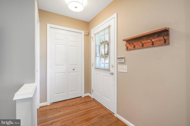 43501 Plantation Ter, Ashburn, VA 20147 - doorway to outside featuring wood finished floors and baseboards