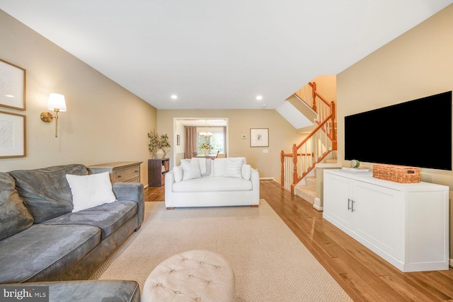 43501 Plantation Ter, Ashburn, VA 20147 - living area featuring stairs, light wood-style flooring, and recessed lighting