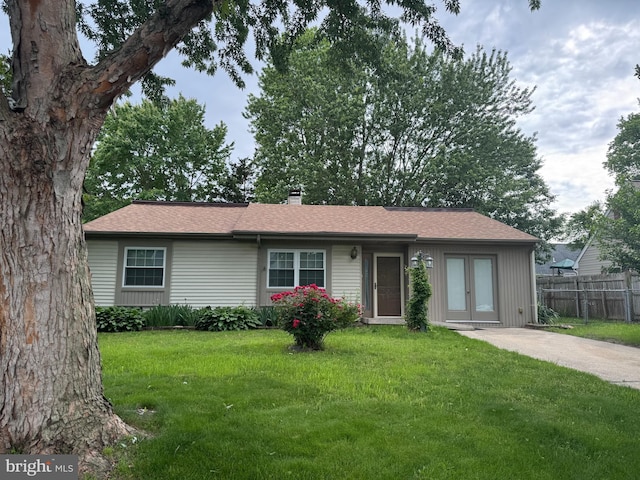 101 Tammie Dr, Dover, DE 19904 - ranch-style home featuring a chimney, french doors, and a shingled roof