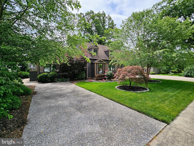 35 Read St, Seaford, DE 19973 - view of front facade featuring driveway and a front lawn
