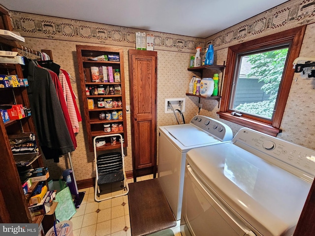 35 Read St, Seaford, DE 19973 - washroom with washer and dryer, wallpapered walls, light flooring, baseboards, and cabinet space