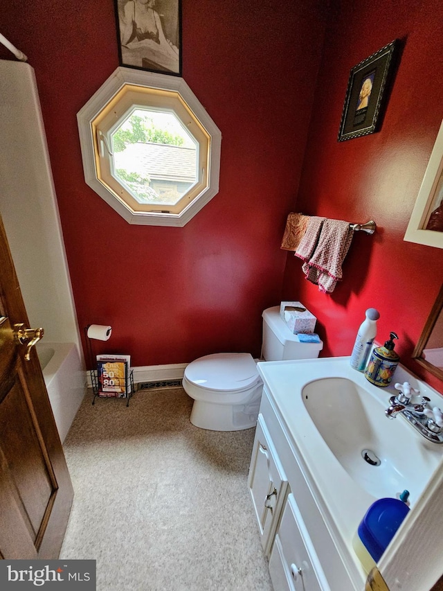 35 Read St, Seaford, DE 19973 - full bathroom with toilet, vanity, a shower, a tub, and baseboards