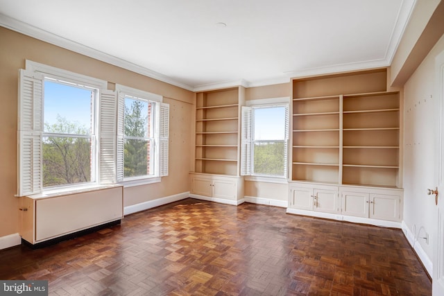 4000 Cathedral Ave NW Unit 517B, Washington, DC 20016 - unfurnished room featuring crown molding, plenty of natural light, and built in shelves