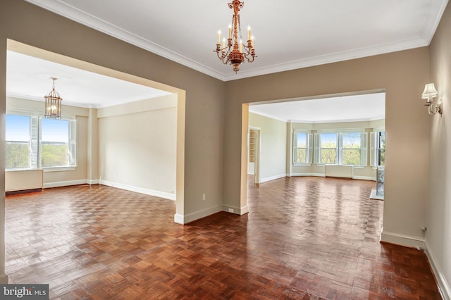 4000 Cathedral Ave NW Unit 517B, Washington, DC 20016 - empty room featuring a chandelier, healthy amount of natural light, and crown molding