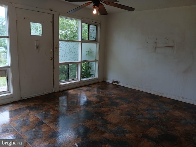 1911 Ray Leonard Rd, Landover, MD 20785 - empty room featuring ceiling fan and stone finish floors