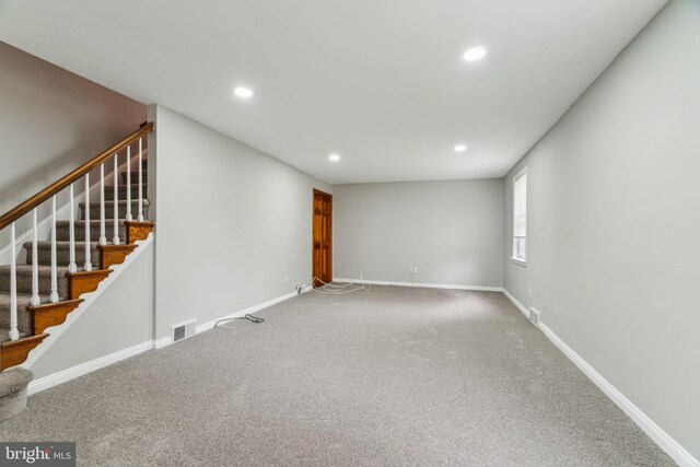 254 Bryn Mawr Ave, Lansdowne, PA 19050 - unfurnished living room with recessed lighting, carpet flooring, stairway, and baseboards