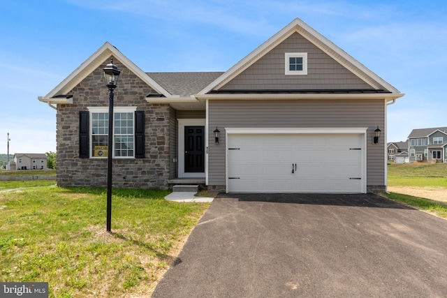 2673 Victorian Dr Lot 64, Dover, PA 17315 - view of front facade with driveway, a front lawn, and stone siding