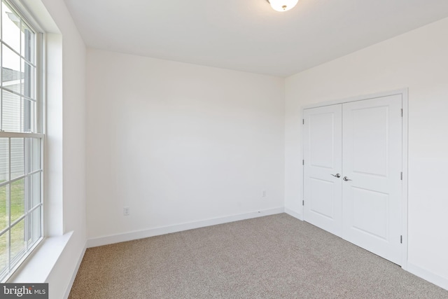 2673 Victorian Dr Lot 64, Dover, PA 17315 - unfurnished bedroom with carpet flooring, multiple windows, and baseboards