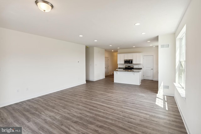 2673 Victorian Dr Lot 64, Dover, PA 17315 - unfurnished living room featuring recessed lighting, wood finished floors, and baseboards