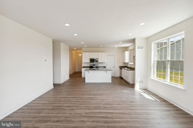 2673 Victorian Dr Lot 64, Dover, PA 17315 - unfurnished living room with a sink, plenty of natural light, recessed lighting, and baseboards