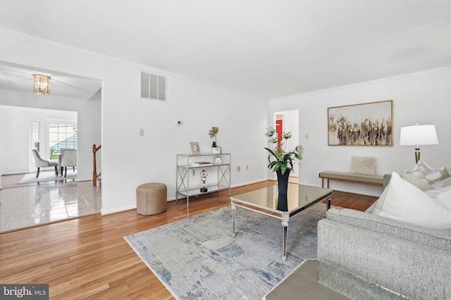 13412 Glen Taylor Ln, Herndon, VA 20171 - living area with ornamental molding and wood finished floors