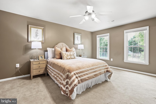 13412 Glen Taylor Ln, Herndon, VA 20171 - bedroom with light colored carpet and ceiling fan