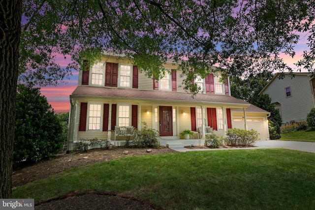 13412 Glen Taylor Ln, Herndon, VA 20171 - view of front facade featuring a porch, a front yard, concrete driveway, and a garage