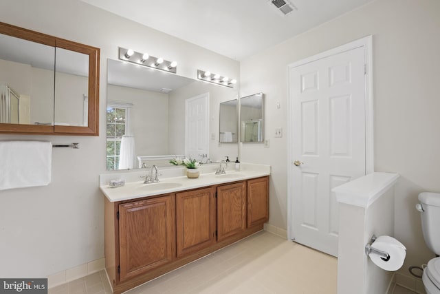13412 Glen Taylor Ln, Herndon, VA 20171 - bathroom featuring toilet and double vanity