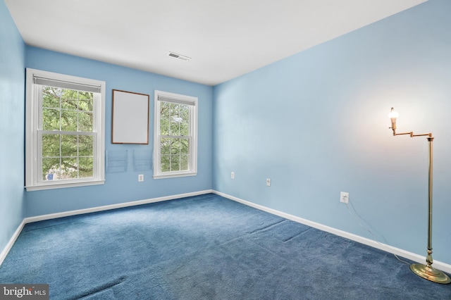 13412 Glen Taylor Ln, Herndon, VA 20171 - spare room with dark colored carpet