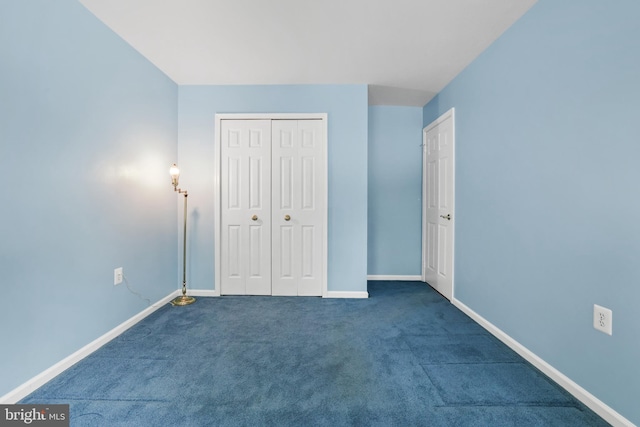 13412 Glen Taylor Ln, Herndon, VA 20171 - unfurnished bedroom featuring dark colored carpet and a closet