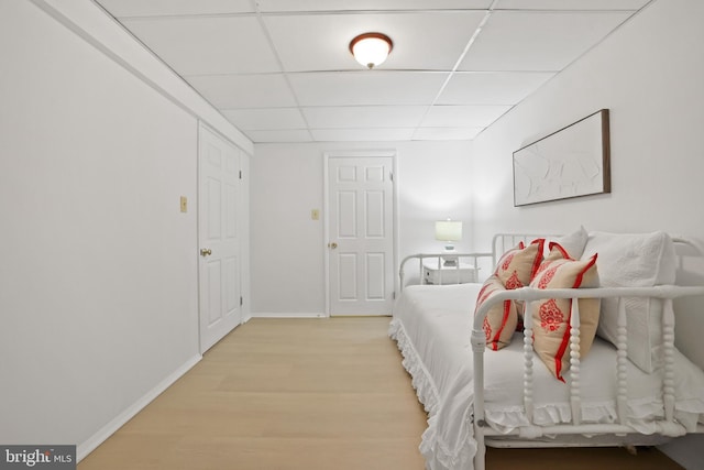 13412 Glen Taylor Ln, Herndon, VA 20171 - bedroom with a paneled ceiling and light wood-type flooring